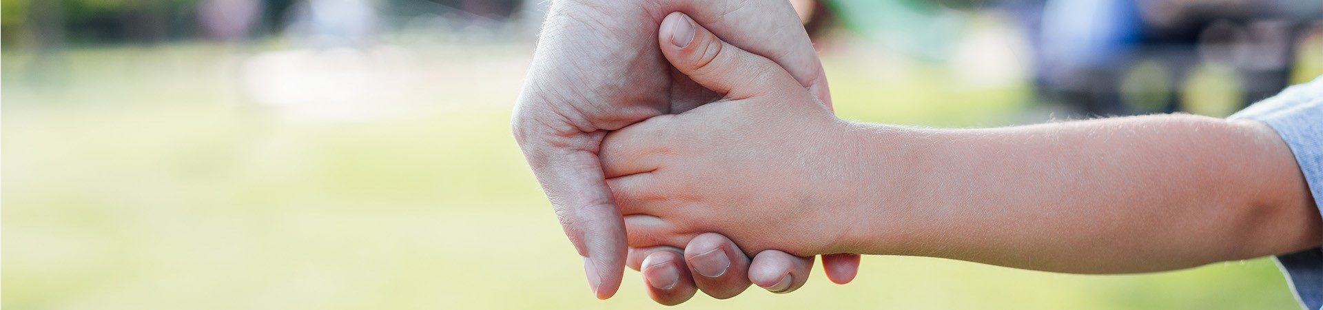 Child holding hand